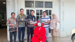 Merchant Unggulan BRI BO Panglima Polim Boyong Hadiah Vespa dari Program Lucky Ride
