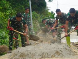 Prajurit Satgas TMMD Ke-129 Genjot Pekerjaan Rabat Jalan Beton di Desa Polewali
