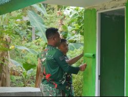 Pengecatan Dinding MCK SDN Desa Pulau Dua, Bukti Nyata Kinerja Satgas TMMD