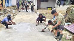 Semangat Gotong Royong Terus ditunjukkan personel Satgas TMMD Ke-129 Kodim 1311/Morowali bersama Masyarakat dalam Mempercepat Pembangunan Rabat Jalan Beton