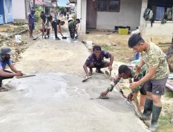 Semangat Gotong Royong Terus ditunjukkan personel Satgas TMMD Ke-129 Kodim 1311/Morowali bersama Masyarakat dalam Mempercepat Pembangunan Rabat Jalan Beton