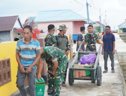 Satgas TMMD Ke-129 Kodim 1311/Morowali Laksanakan Pembersihan Lingkungan Bersama Warga