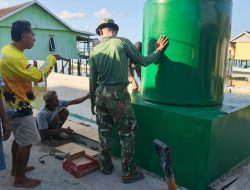 Satgas TMMD Pasang Tandon Air Program Manunggal Air di Desa Umbele