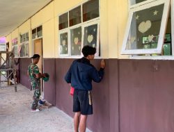 Satgas TMMD Bersama Masyarakat Laksanakan Pengecatan SDN Polewali