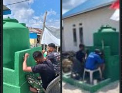 Satgas TMMD Lukis Identitas TMMD di Lokasi Manunggal Air Bersih